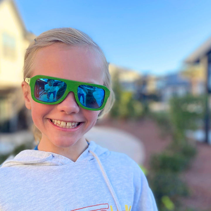 Lyla Wears the Rossi Wood Sunglasses in Green