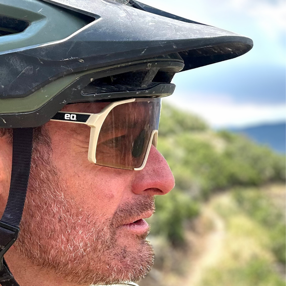 uno mas brown with photochromic lens worn by a handsome man