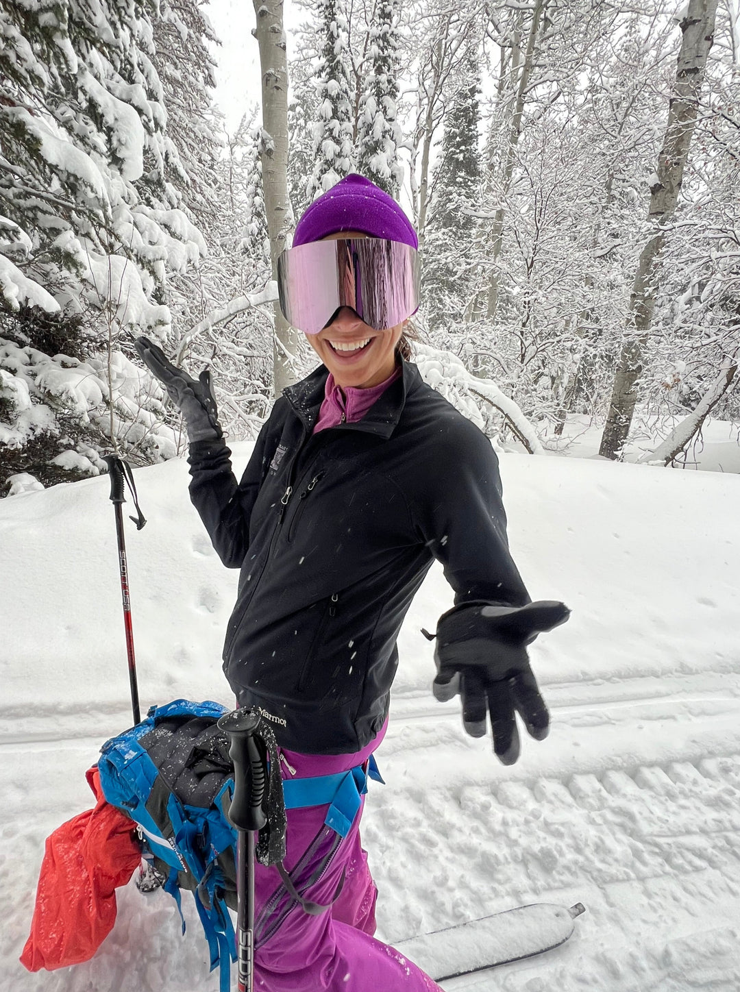 Ali shows us her pink Eastern Outer ski goggles while in the backcountry